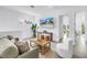 Bright living room with white walls, modern furniture, and neutral accents create an inviting and stylish space at 2314 Floyd St, Sarasota, FL 34239