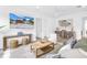Modern living room featuring neutral walls, stylish furnishings, and bright lighting create a chic and inviting space at 2314 Floyd St, Sarasota, FL 34239