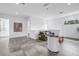 Open loft area with modern decor, neutral color palette, and comfortable seating creating a cozy and stylish retreat at 2314 Floyd St, Sarasota, FL 34239