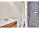 Bathroom featuring a tiled walk-in shower, modern fixtures, and vanity at 3205 33Rd Street W Ct, Bradenton, FL 34205