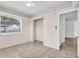 Bedroom with an open closet, tile floor, and a window providing natural light at 3205 33Rd Street W Ct, Bradenton, FL 34205