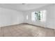 Bright living room featuring tile floors and neutral walls providing an open and airy feel at 3205 33Rd Street W Ct, Bradenton, FL 34205