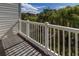 Balcony overlooking beautiful trees with a partial view of a residence nearby at 3409 10Th W Ln, Palmetto, FL 34221