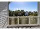 Balcony view of neighboring houses and lush greenery at 3409 10Th W Ln, Palmetto, FL 34221