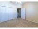 Bedroom with ample closet space and neutral carpeting at 3409 10Th W Ln, Palmetto, FL 34221