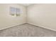 Cozy bedroom with neutral carpeting and a sunny window at 3409 10Th W Ln, Palmetto, FL 34221