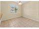 Dining room with window and tan tiled flooring at 3409 10Th W Ln, Palmetto, FL 34221