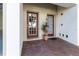 Paver entrance to residence with double doors, potted plant, and neutral colors at 3409 10Th W Ln, Palmetto, FL 34221