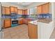 Kitchen with stainless appliances, granite countertops, and custom cabinets at 3409 10Th W Ln, Palmetto, FL 34221