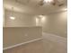 Neutral landing space with carpet flooring and railing, offering a transition to other areas at 3707 45Th W Ter # 104, Bradenton, FL 34210