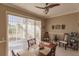 Dining room with seating for six, sliding glass doors, and bright, natural light at 3835 W Price Blvd, North Port, FL 34286