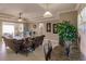 Comfortable living area featuring open layout, leading to the dining area, with neutral paint at 3835 W Price Blvd, North Port, FL 34286