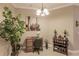 Office space features a desk, chair, shelving, and natural light at 3835 W Price Blvd, North Port, FL 34286