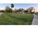 Quaint single-story home with a spacious front yard, surrounded by mature trees at 4223 Sawyer Rd, Sarasota, FL 34233