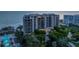 Beautiful beachfront condo with a pool, tropical landscaping, and stunning views of the ocean at 435 L Ambiance Dr # Ph-J, Longboat Key, FL 34228