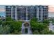 Beautiful beachfront condo with lush landscaping and stunning views of the ocean at sunset at 435 L Ambiance Dr # Ph-J, Longboat Key, FL 34228
