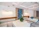 Contemporary lobby showcasing seating area, unique wall art, and modern lighting fixtures at 435 L Ambiance Dr # Ph-J, Longboat Key, FL 34228