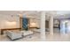 Modern lobby features elegant seating, accent wall, and stylish decor at 435 L Ambiance Dr # Ph-J, Longboat Key, FL 34228