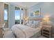 Bright main bedroom with ocean views and ensuite access to the balcony at 435 L Ambiance Dr # Ph-J, Longboat Key, FL 34228