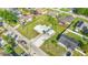 Aerial view of a cozy home featuring green landscaping, fenced backyard, and boat storage at 4519 Brooksdale Dr, Sarasota, FL 34232