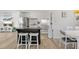 Stylish open kitchen with modern appliances, a center island, and natural light at 4519 Brooksdale Dr, Sarasota, FL 34232