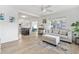 Living room view showcasing seamless flow into kitchen, providing airy and bright space at 4519 Brooksdale Dr, Sarasota, FL 34232