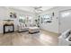Inviting living room with natural light, neutral-toned furniture, and stylish decor at 4519 Brooksdale Dr, Sarasota, FL 34232