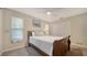 Comfortable bedroom with a ceiling fan, closet and bright window at 4611 Spahn St, Sarasota, FL 34232