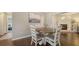Charming dining area with a view into the living room and access to the bedroom hallway at 4611 Spahn St, Sarasota, FL 34232