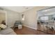 Inviting living room with hardwood floors, comfortable seating, and an open layout into the dining area at 4611 Spahn St, Sarasota, FL 34232