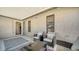 Comfortable outdoor patio area with seating and a view of an open doorway into the home at 4611 Spahn St, Sarasota, FL 34232