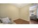 Cozy sitting room with hardwood floors and a comfortable sofa near an adjacent room at 4611 Spahn St, Sarasota, FL 34232