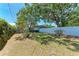 Well-maintained backyard with a white fence, offering a secure and private outdoor space at 4907 18Th W Ave, Bradenton, FL 34209