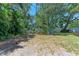 Secluded backyard surrounded by lush landscaping and privacy fence for tranquility at 4907 18Th W Ave, Bradenton, FL 34209