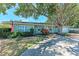 Charming home with a beautiful green yard and a mature tree providing ample shade at 4907 18Th W Ave, Bradenton, FL 34209