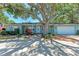Traditional home with an expansive yard featuring mature trees that offer generous shade at 4907 18Th W Ave, Bradenton, FL 34209
