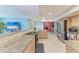 Open kitchen featuring granite countertops, stainless steel appliances, and bar stool seating at 4907 18Th W Ave, Bradenton, FL 34209