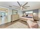 Beautiful main bedroom with custom wall trim, ceiling fan, and plenty of natural lighting at 4907 18Th W Ave, Bradenton, FL 34209