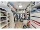 Spacious walk-in closet with custom shelving and ample storage space for clothing and accessories at 4907 18Th W Ave, Bradenton, FL 34209