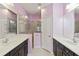 Bathroom boasting double sinks, mirrors and glass enclosed shower at 5418 Fairfield Blvd, Bradenton, FL 34203