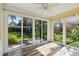 Enclosed lanai with wood flooring and many windows for lots of natural light at 5418 Fairfield Blvd, Bradenton, FL 34203