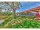 Beautiful home on the water featuring a wall of windows to maximize the beautiful water views at 5651 Golf Pointe Dr # 5651, Sarasota, FL 34243