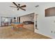 Bright game room with a pool table that opens to the living room at 5651 Golf Pointe Dr # 5651, Sarasota, FL 34243