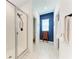 Bright bathroom features glass shower doors and tile floors at 5735 Bungalow Grove Ct, Palmetto, FL 34221