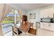 Eat-in kitchen dining area with sliding glass doors to the patio at 5735 Bungalow Grove Ct, Palmetto, FL 34221