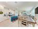 Open floor plan showcasing the kitchen, dining area, and living room at 5735 Bungalow Grove Ct, Palmetto, FL 34221