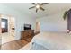 A partial view of the primary bedroom which includes a view of the en-suite bathroom at 5735 Bungalow Grove Ct, Palmetto, FL 34221