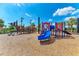 The community playground offers a fun, safe area for to play and explore, with colorful structures at 5735 Bungalow Grove Ct, Palmetto, FL 34221