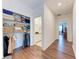 Hallway with a walk-in closet, and a bathroom with a vanity and a shower with tub combination at 5735 Bungalow Grove Ct, Palmetto, FL 34221