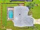 Overhead shot of the home and its backyard with a sparkling pool at 5742 39Th Street E Cir, Bradenton, FL 34203